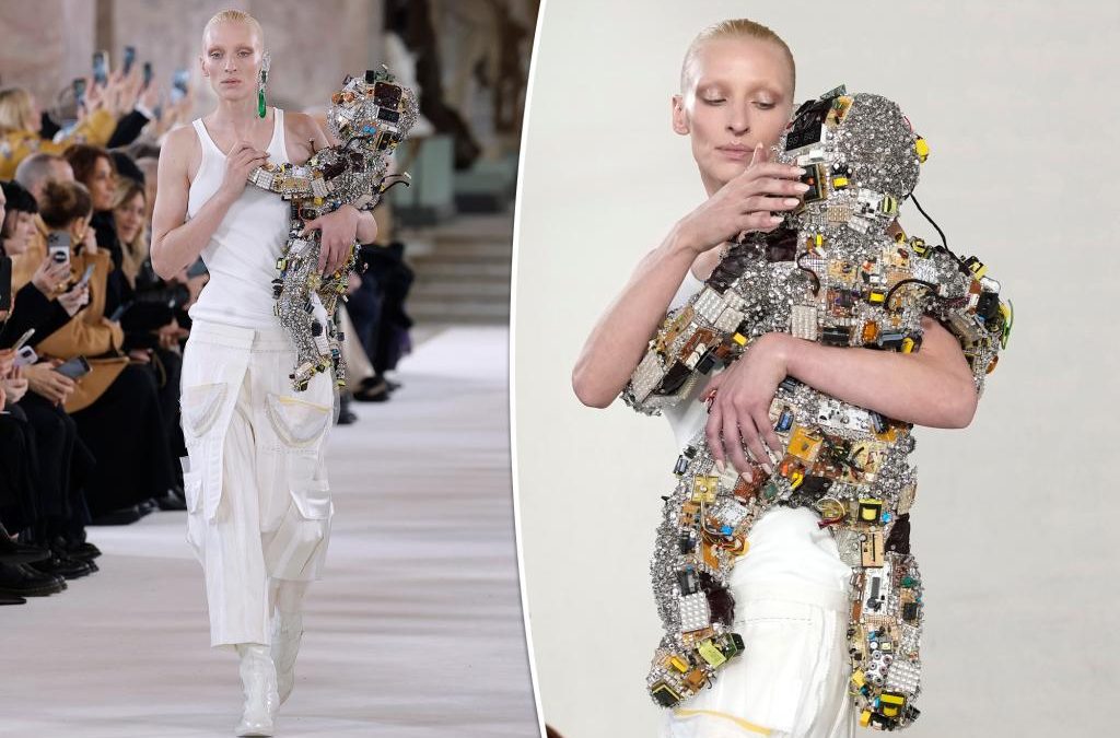 Schiaparelli stuns with couture robot baby, motherboard dress